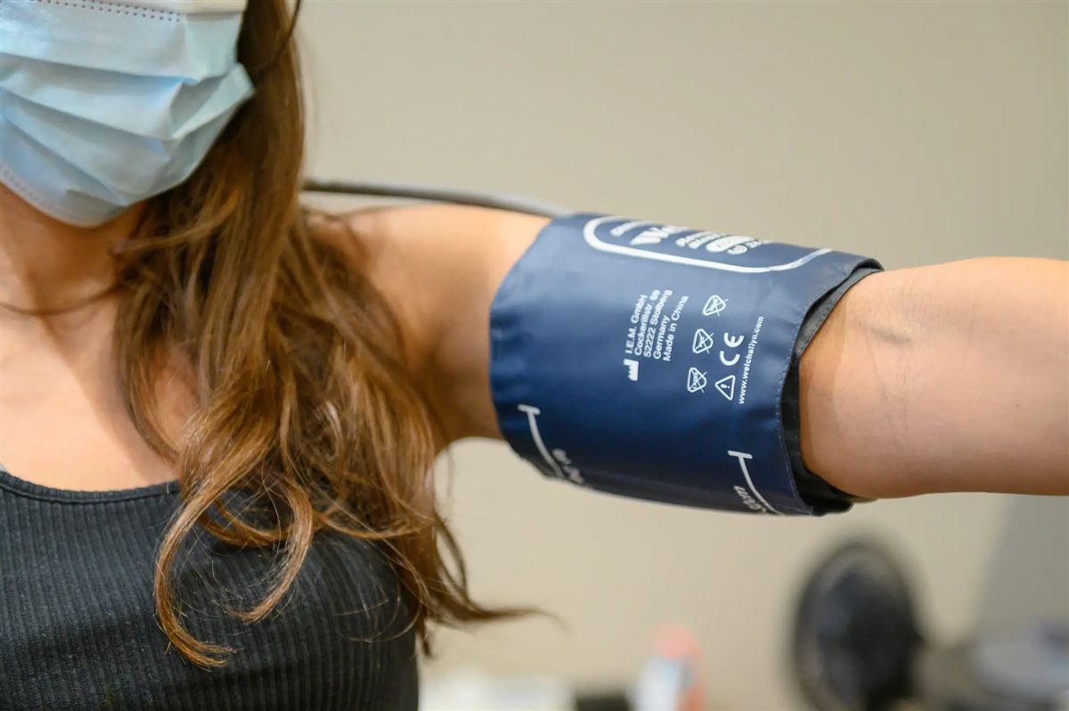 ABPM cuff connected to its portable device